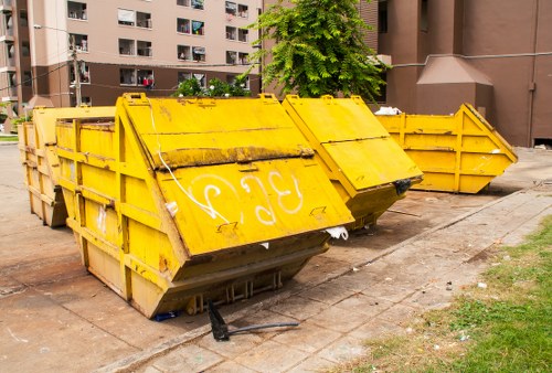 Chelsea street-side commercial recycling bins and staff sorting waste