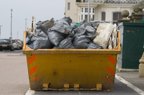 Builders waste being cleared from a construction site in Chelsea